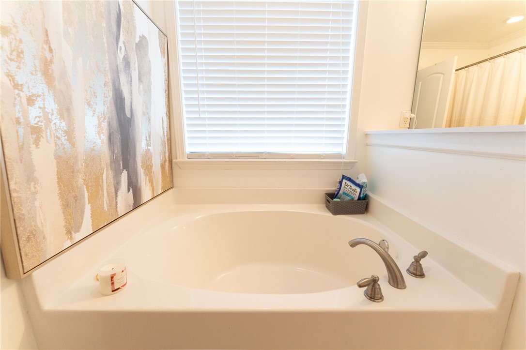 1012 Whirlaway Circle Anderson, SC 29621 - Photo 15 of 25 Relax and unwind in this inviting built-in soaking tub, framed by a window with privacy blinds.
