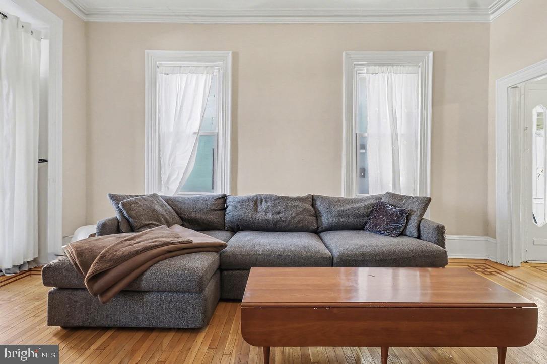 1410 Castle Avenue Philadelphia, PA 19145 - Photo 14 of 38 a living room with furniture and a window