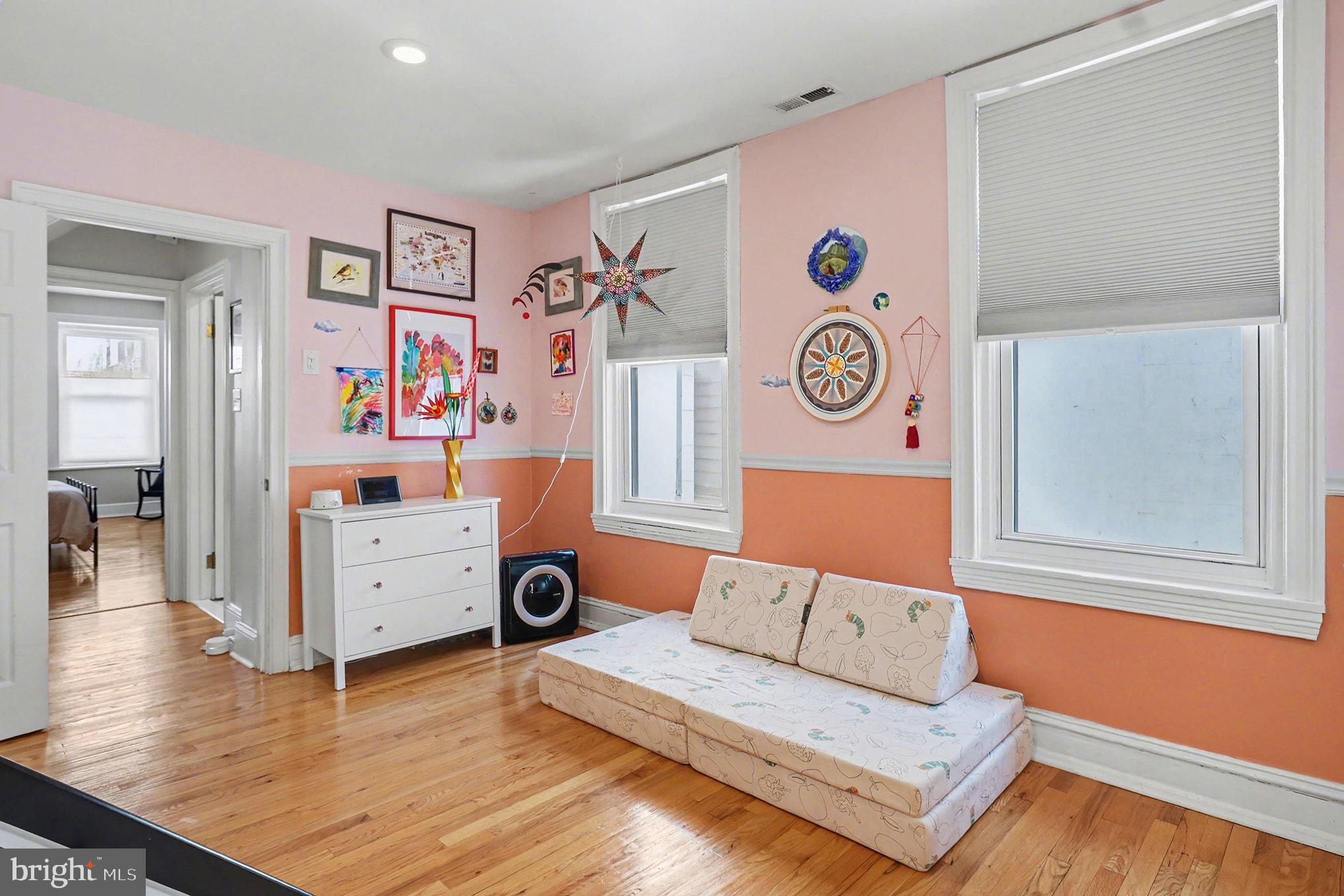 1410 Castle Avenue Philadelphia, PA 19145 - Photo 21 of 38 a living room with furniture and wooden floor