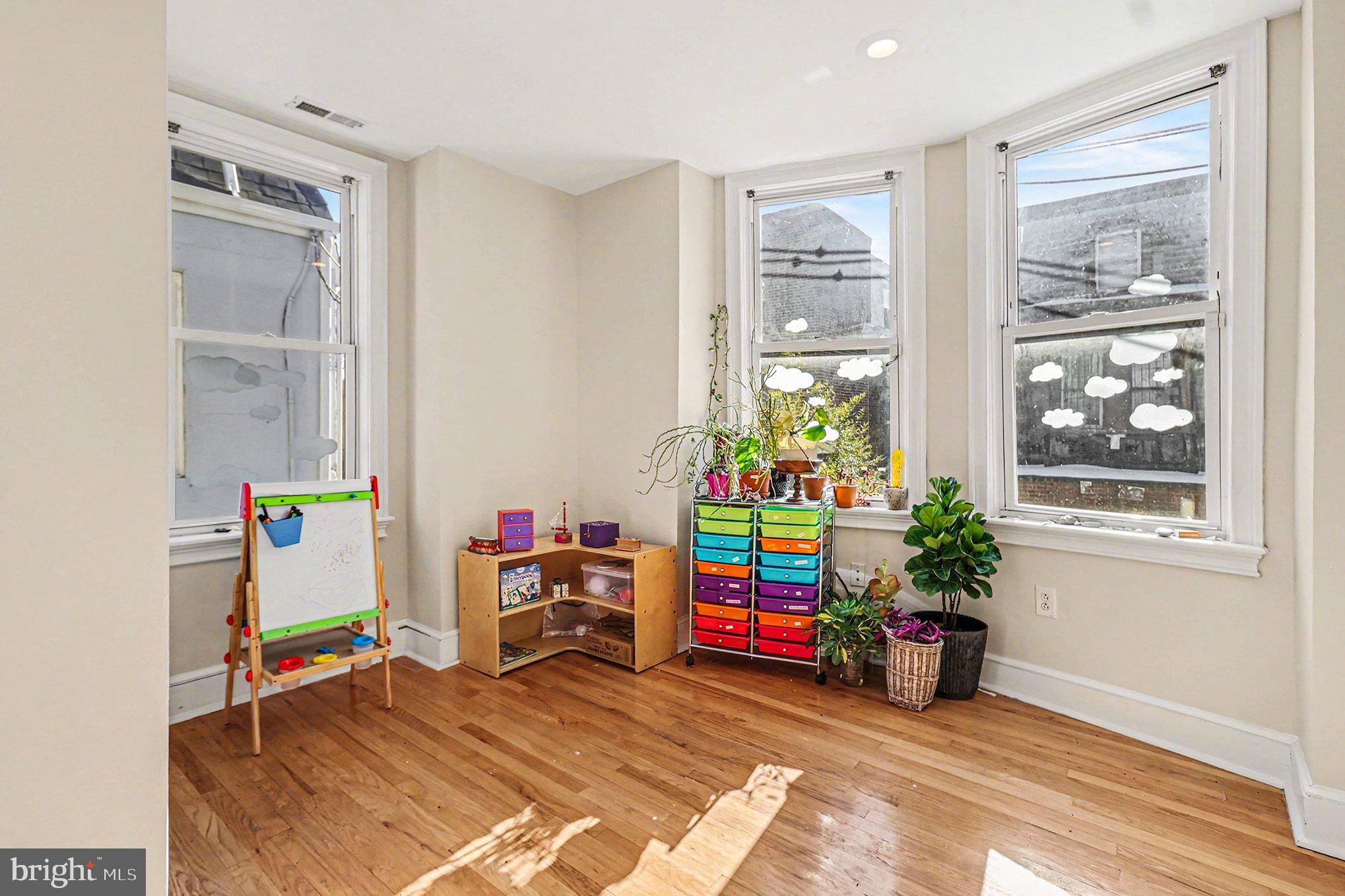 1410 Castle Avenue Philadelphia, PA 19145 - Photo 22 of 38 a view of play room with toys and windows