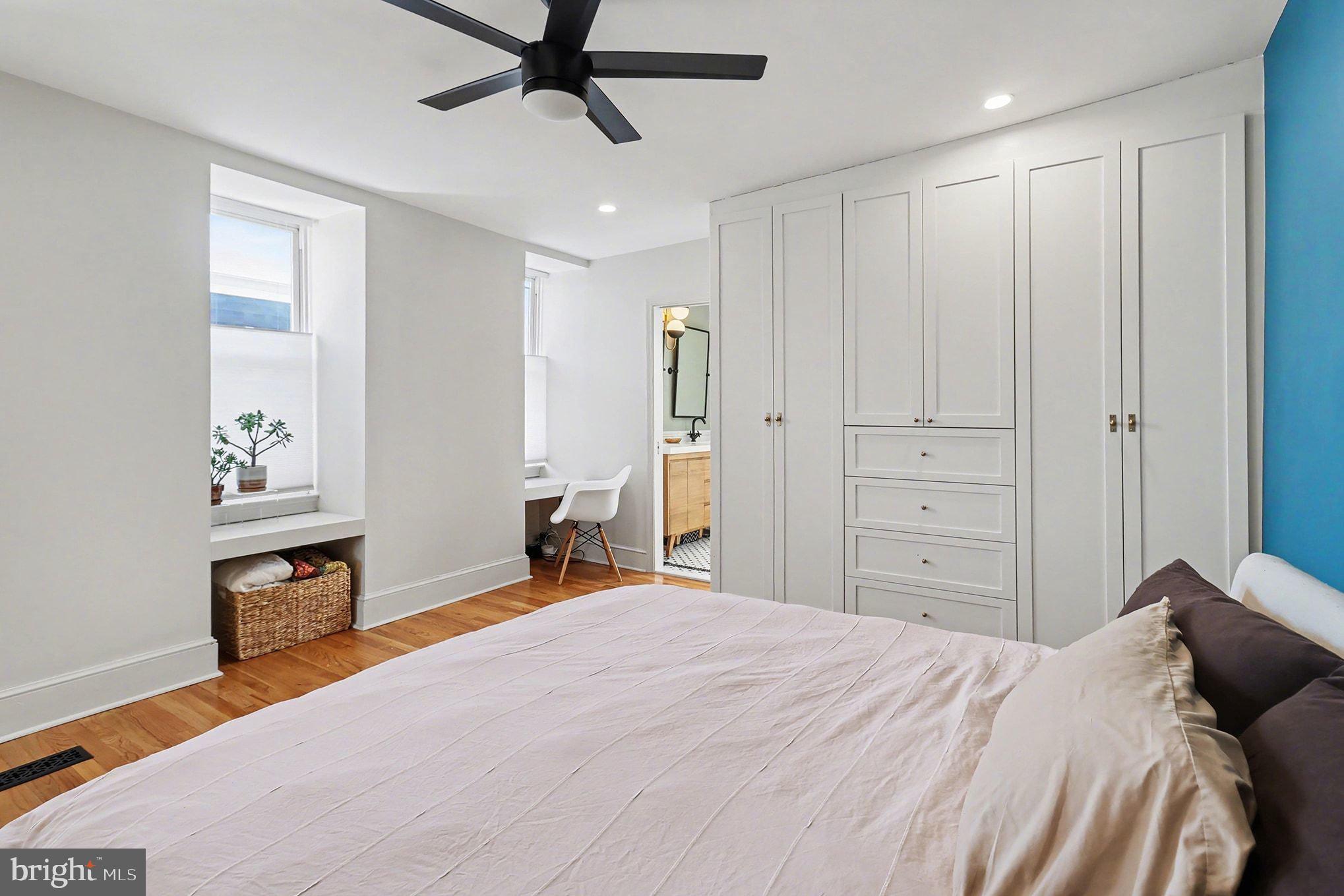 1410 Castle Avenue Philadelphia, PA 19145 - Photo 30 of 38 a bedroom with a bed and a chandelier