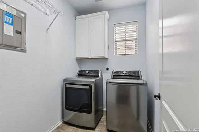 a kitchen with a stove and a microwave