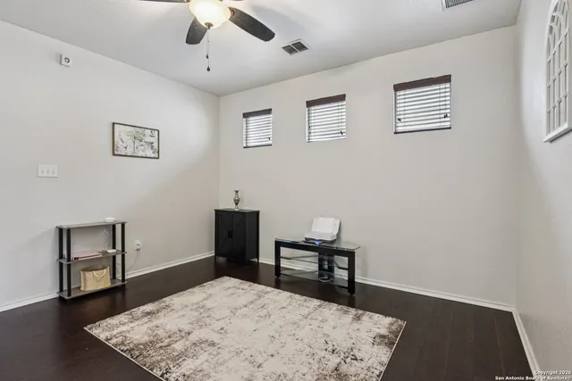 a view of a livingroom with a workspace