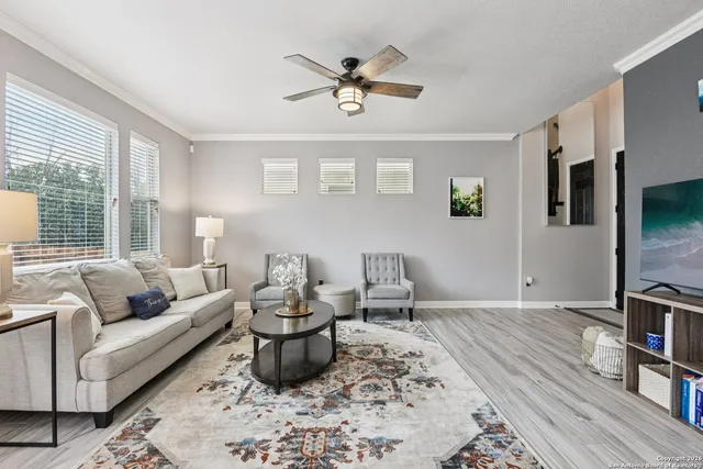 a living room with furniture and a window