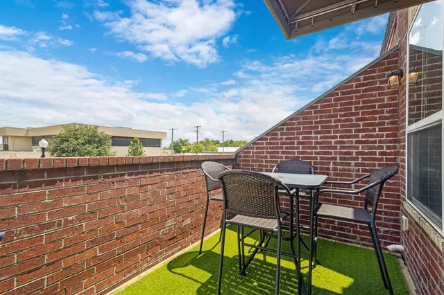 a bedroom with a bed and a television