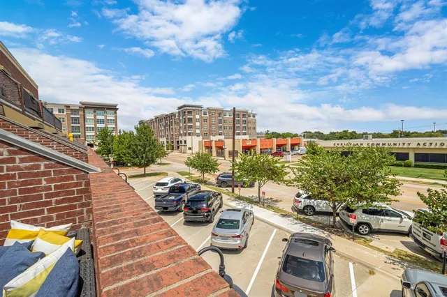 a patio with table and chairs