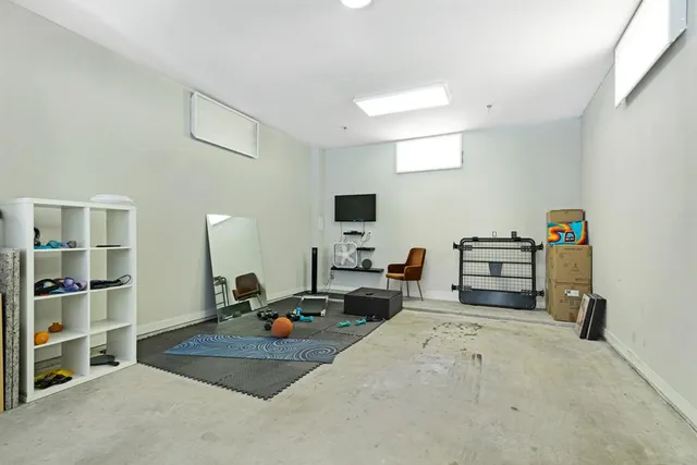 a view of a terrace with swimming pool and seating space