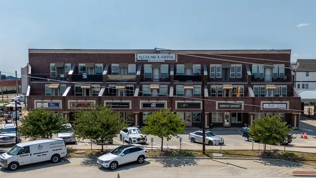 a car parked in front of a building