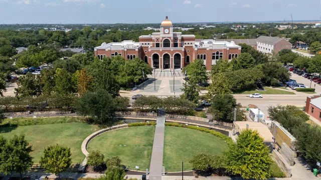 a aerial view of a house with swimming pool