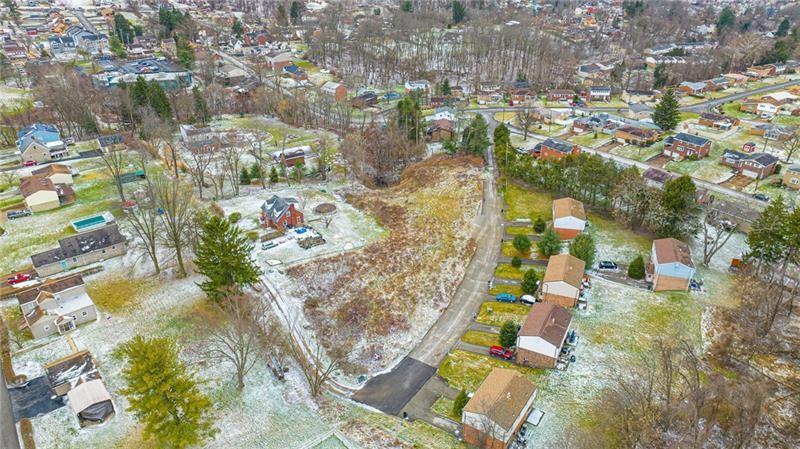 Lot 303 B Locust Ridge Drive Pittsburgh, PA 15209 - Photo 17 of 17 an aerial view of residential houses with outdoor space