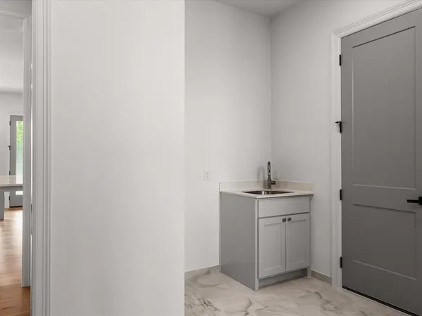 a room with a sink and vanity