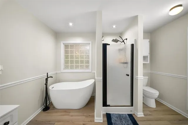 a kitchen with a stove and a refrigerator