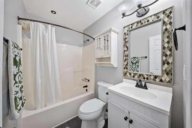 an aerial view of a house with swimming pool