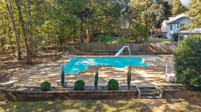 a bedroom with a bed and walk in closet