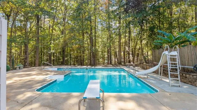 a bed room with a bed and furniture