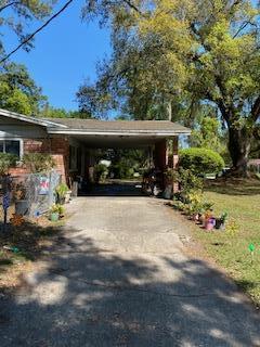 4605 Silver Ridge Drive Jacksonville, FL 32207 - Photo 4 of 6 a view of outdoor space with yard and tree s