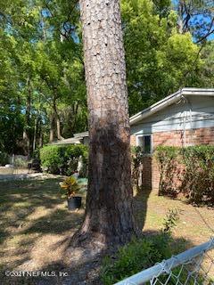 4605 Silver Ridge Drive Jacksonville, FL 32207 - Photo 5 of 6 a view of a yard with plants