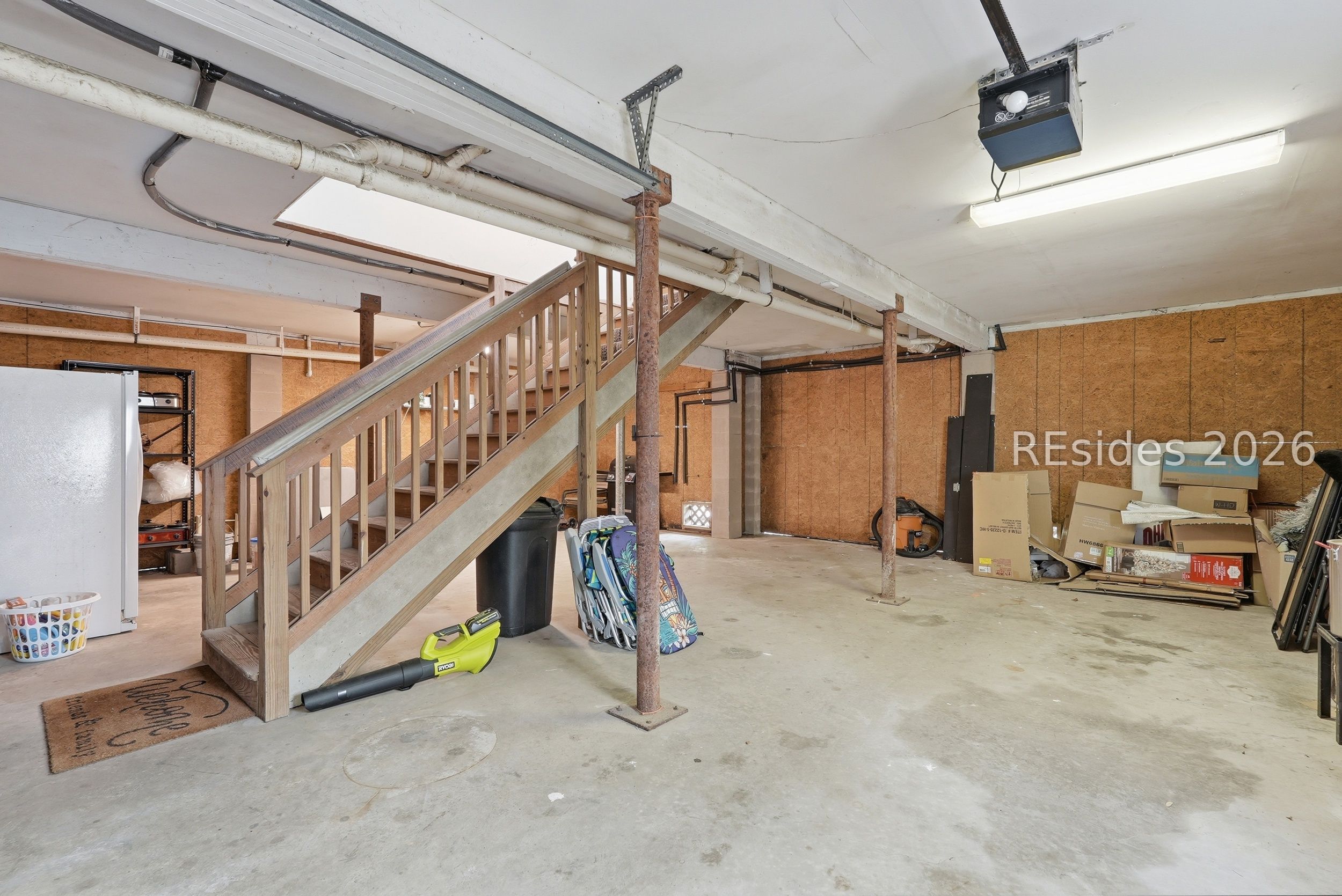 10 Pine Burr Road East, Unit 5 Hilton Head Island, SC 29926 - Photo 27 of 38 Spacious garage w/1 car parking and extra storage