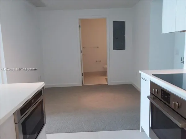 a picture of a book in a white wall