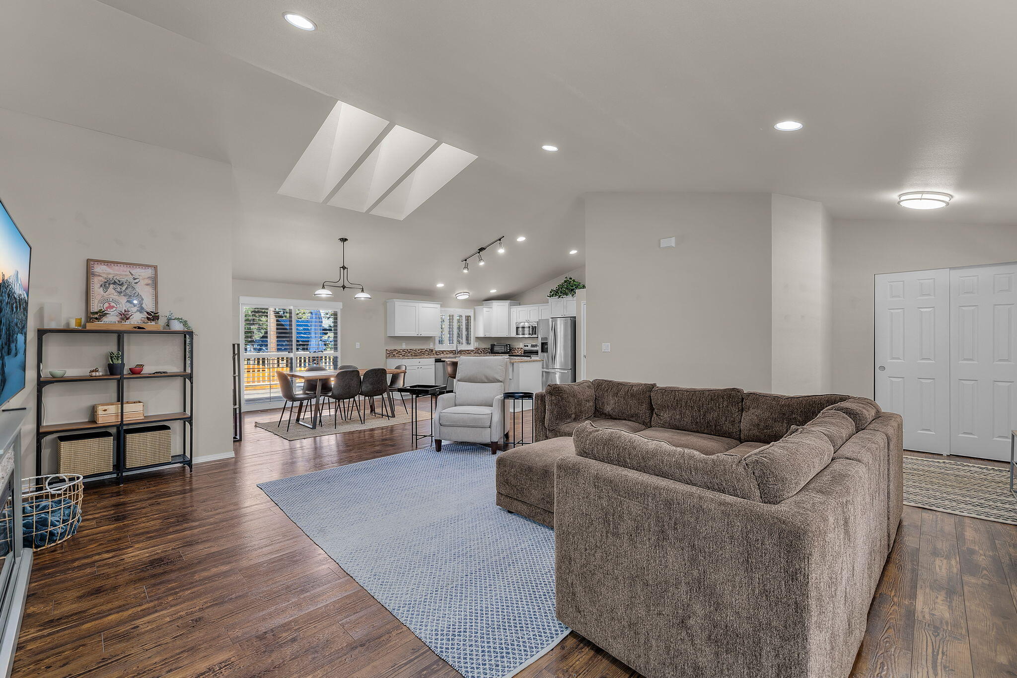 17064 Sacramento Road Bend, OR 97707 - Photo 9 of 50 a living room with furniture and a wooden floor