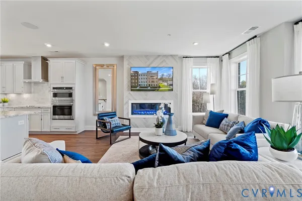 a bathroom with a sink a toilet and a window