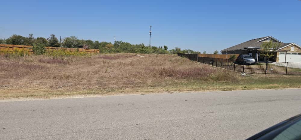 169 El Rey Drive Kyle, TX 78640 - Photo 4 of 10 View of asphalt street with a rural view