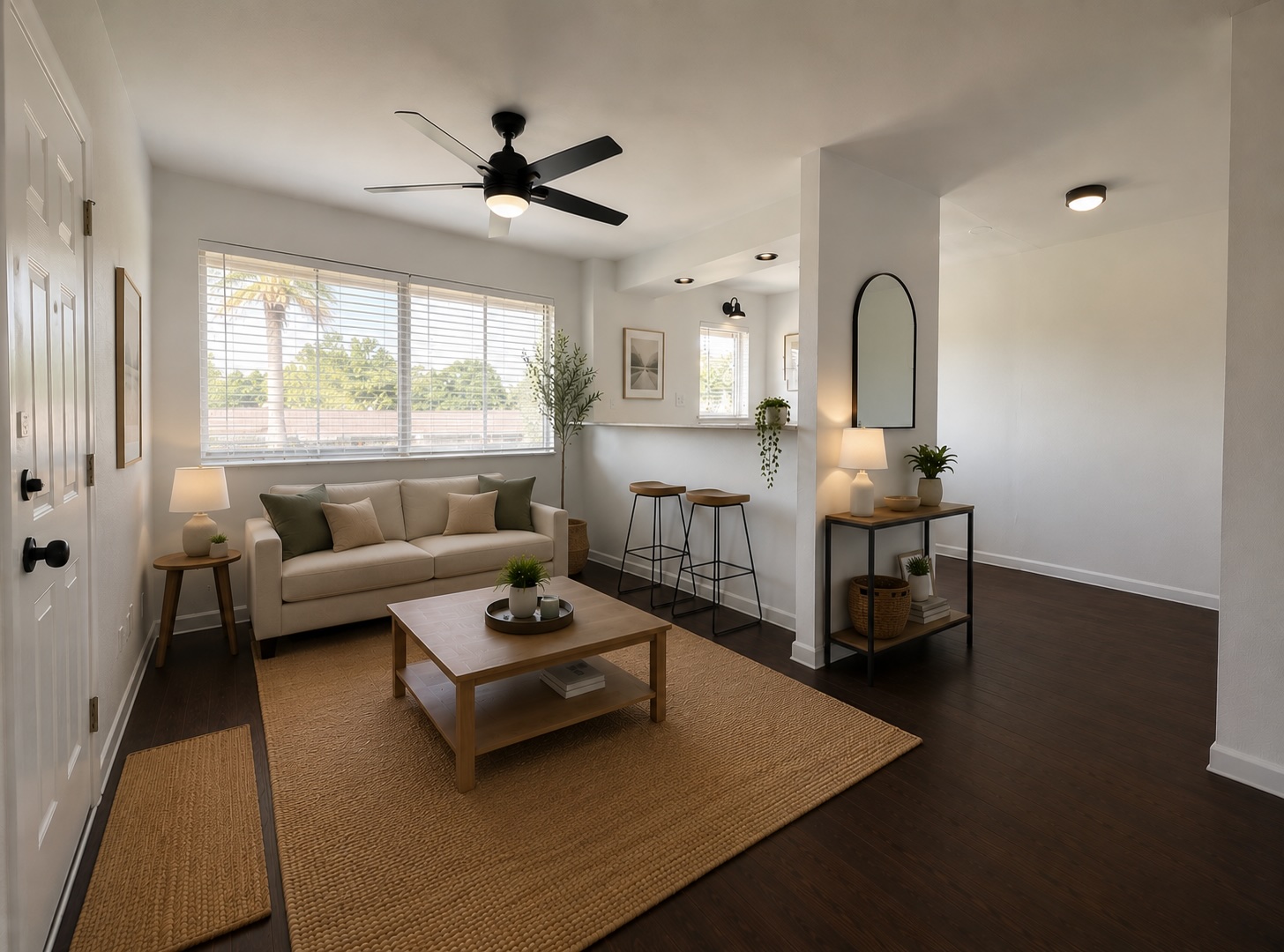 3304 Red River Street, Unit 203 Austin, TX 78705 - Photo 2 of 16 a living room with furniture and a large window