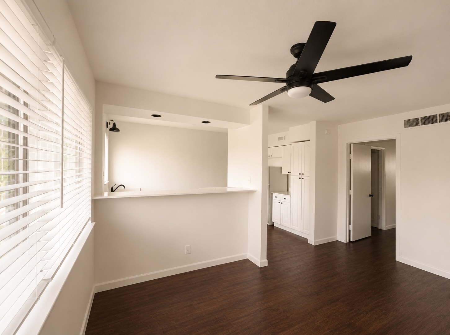 3304 Red River Street, Unit 203 Austin, TX 78705 - Photo 3 of 16 a view of empty room with wooden floor and window