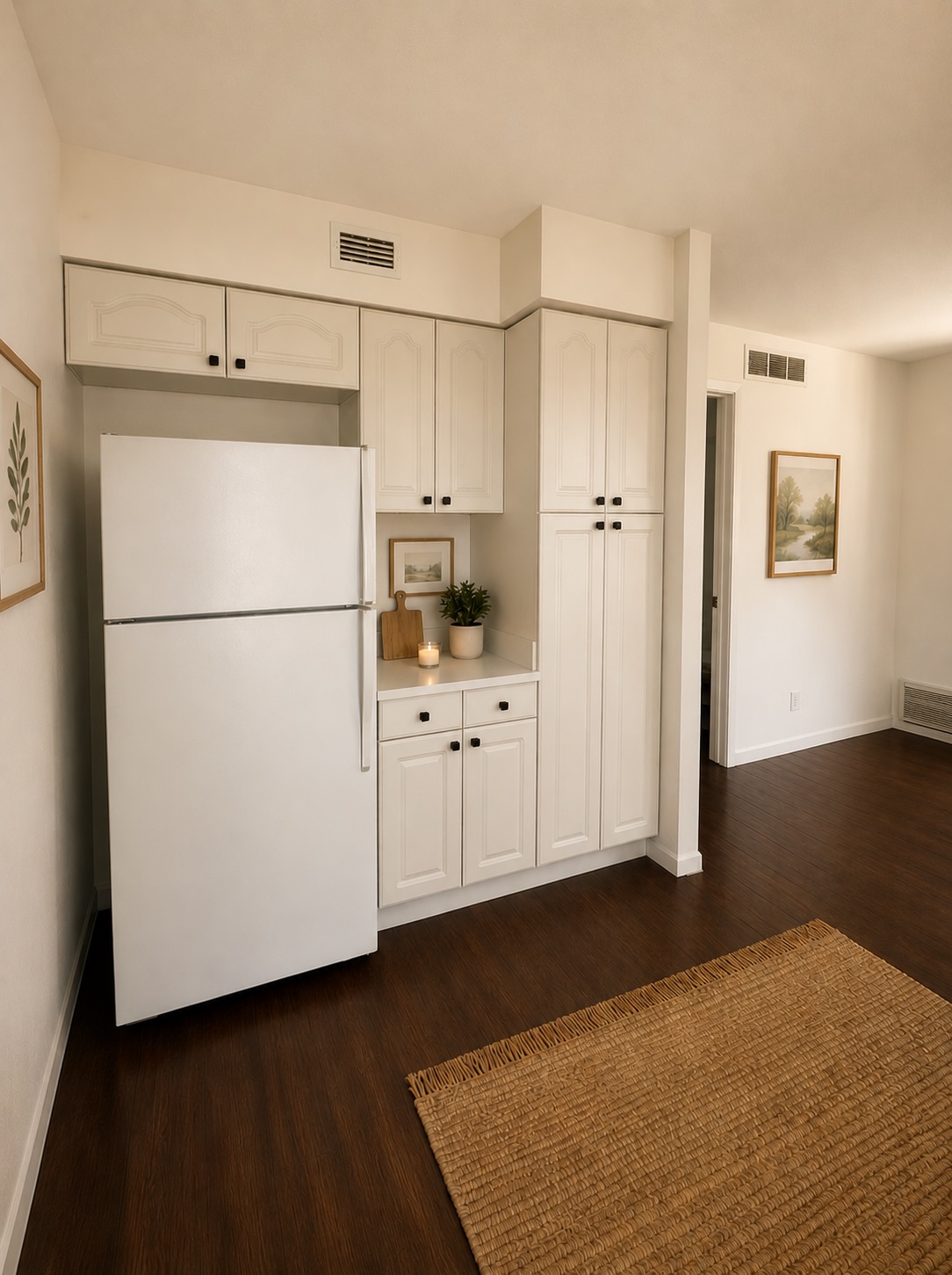 3304 Red River Street, Unit 203 Austin, TX 78705 - Photo 5 of 16 a white refrigerator freezer sitting in a kitchen