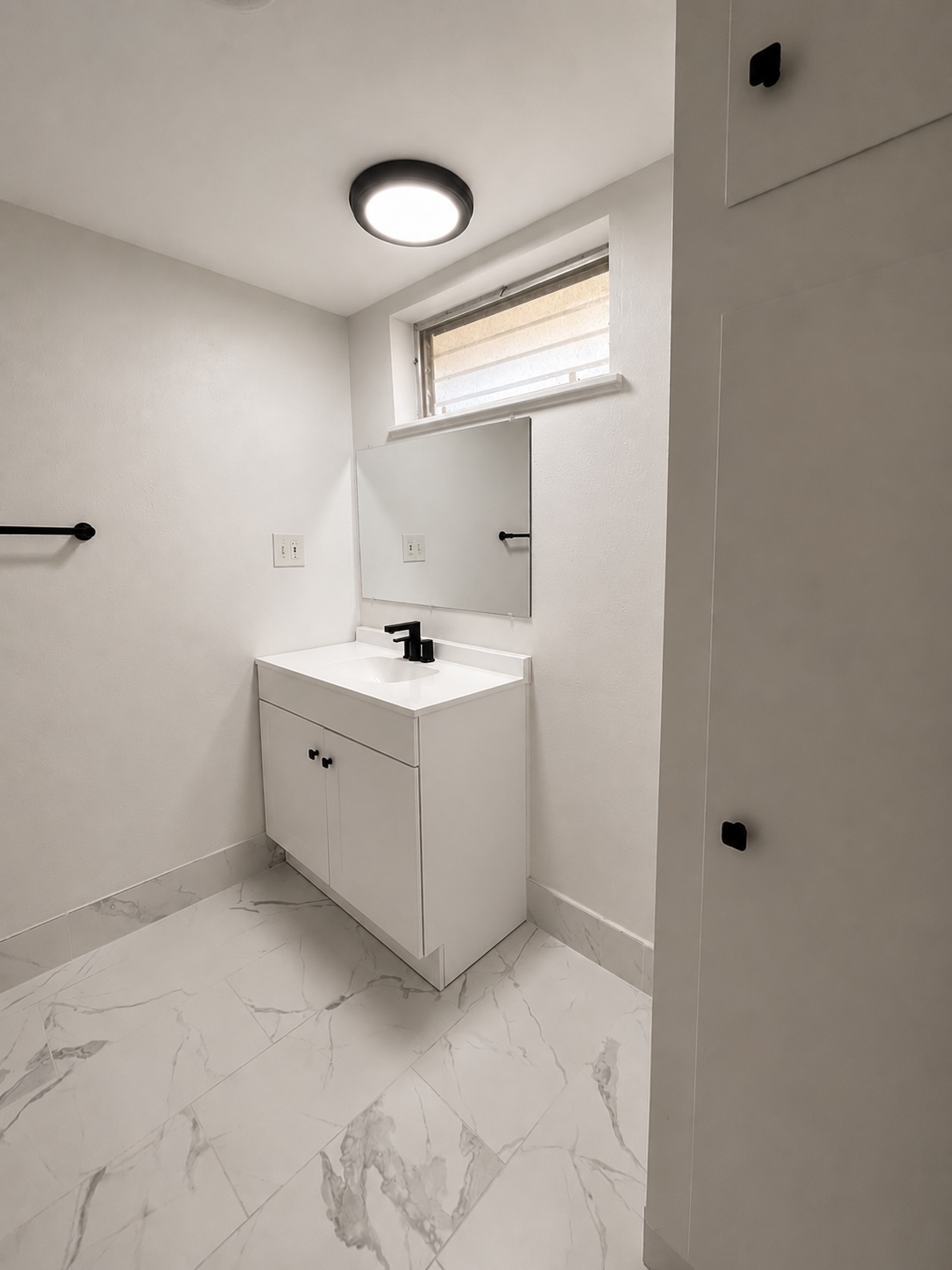 3304 Red River Street, Unit 203 Austin, TX 78705 - Photo 8 of 16 a utility room with cabinets