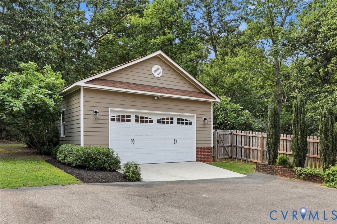 2904 Old Gun Road West Midlothian, VA 23113 - Photo 49 of 59 Detached two-car garage with panel siding, brick a