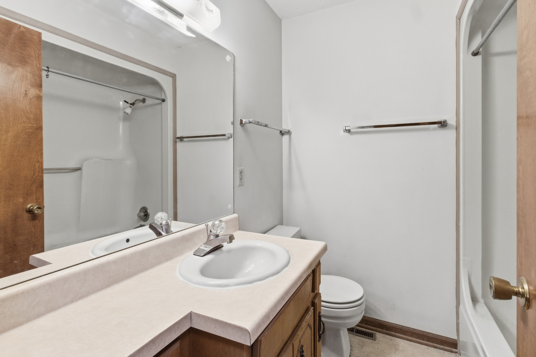 139 Magnolia Lane Normandy, TN 37360 - Photo 11 of 17 a bathroom with a sink toilet and a mirror