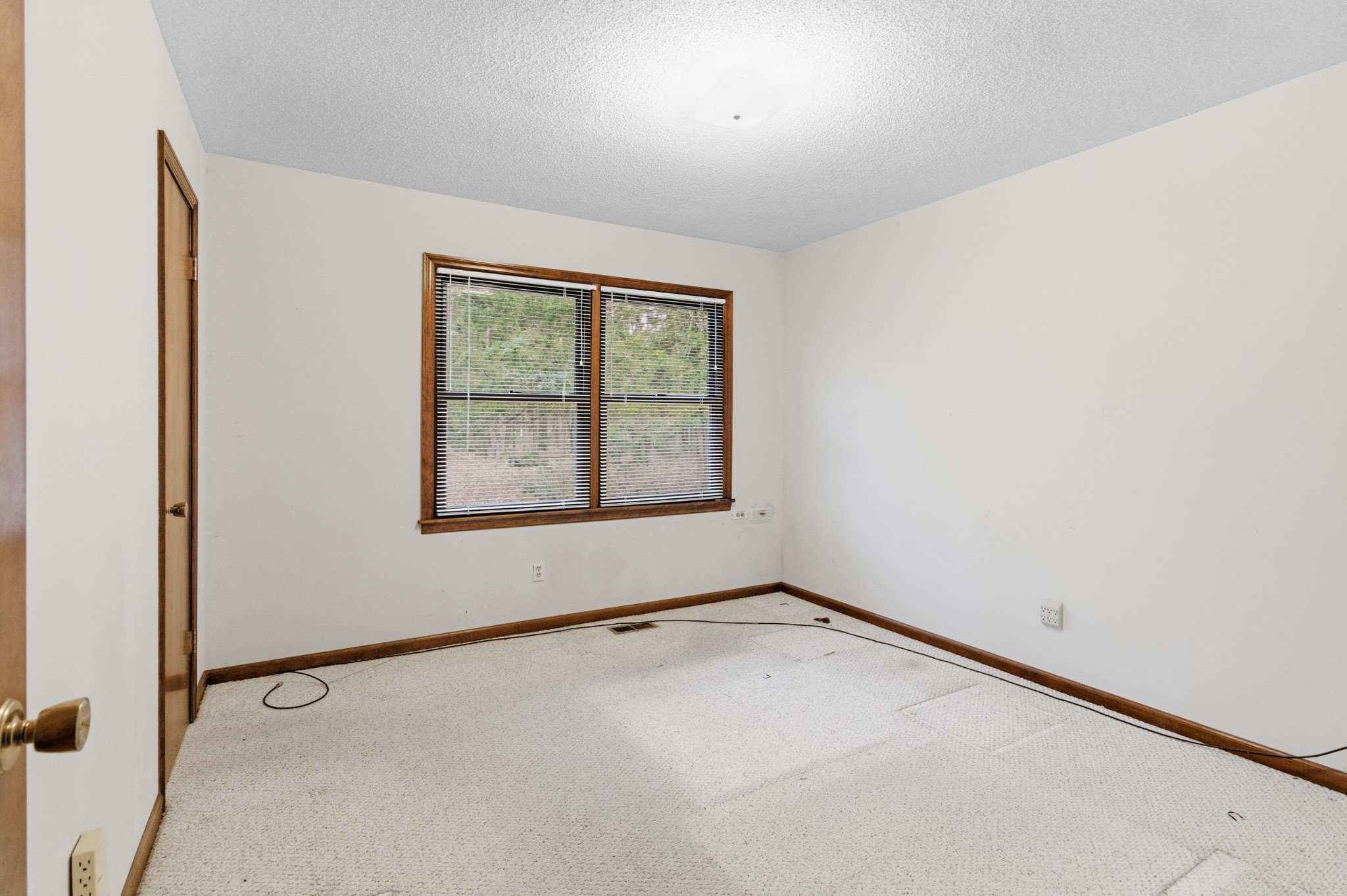 139 Magnolia Lane Normandy, TN 37360 - Photo 12 of 17 an empty room with windows