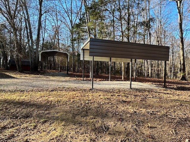 139 Magnolia Lane Normandy, TN 37360 - Photo 14 of 17 a house with trees in front of it