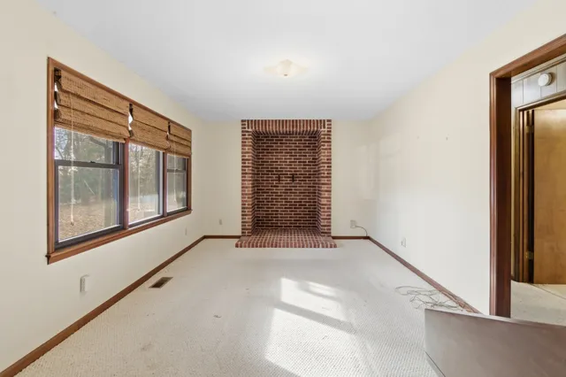 an empty room with windows