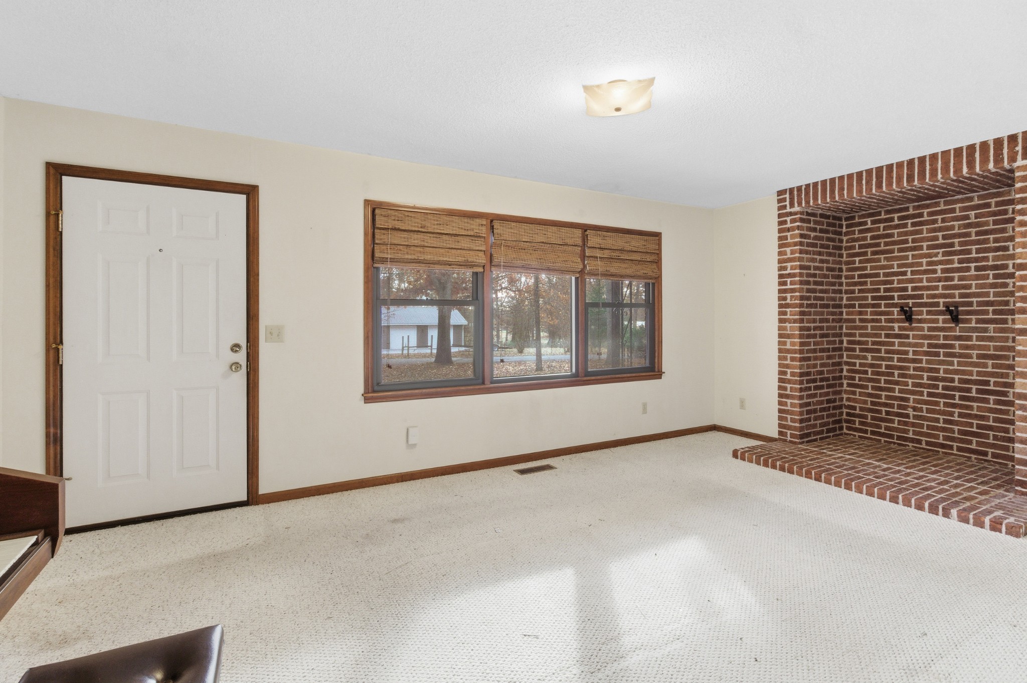 139 Magnolia Lane Normandy, TN 37360 - Photo 4 of 17 an empty room with windows
