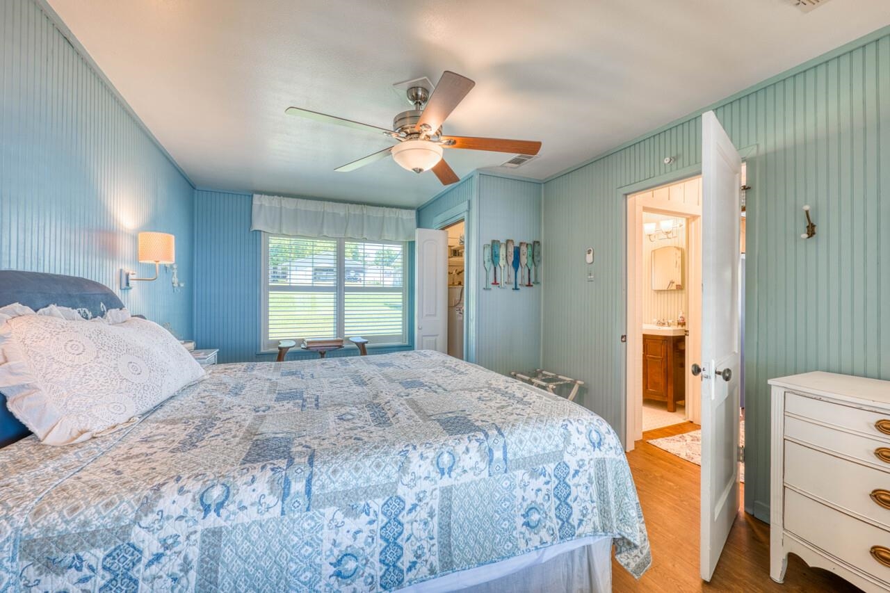 809 Lakeshore Loop Tow, TX 78672 - Photo 14 of 33 a bedroom with a bed and a window