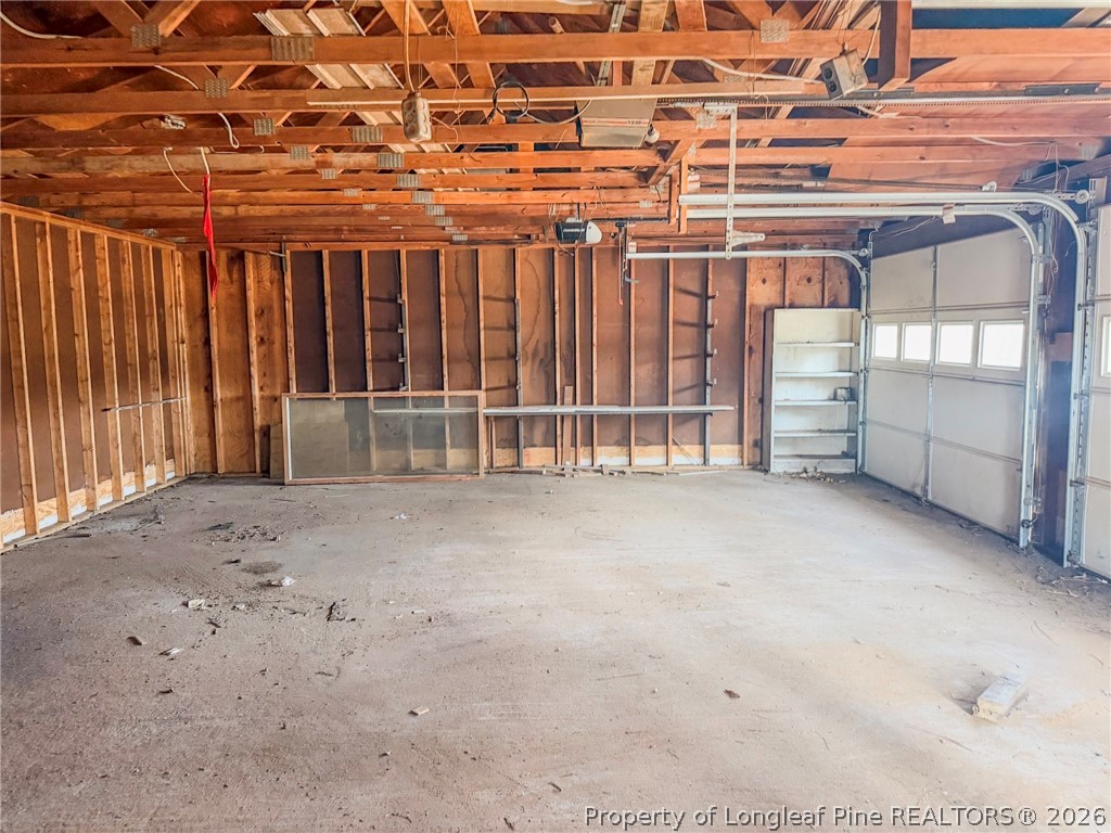 575 Veterans Road St. Pauls, NC 28384 - Photo 25 of 27 a view of a garage with wooden walls