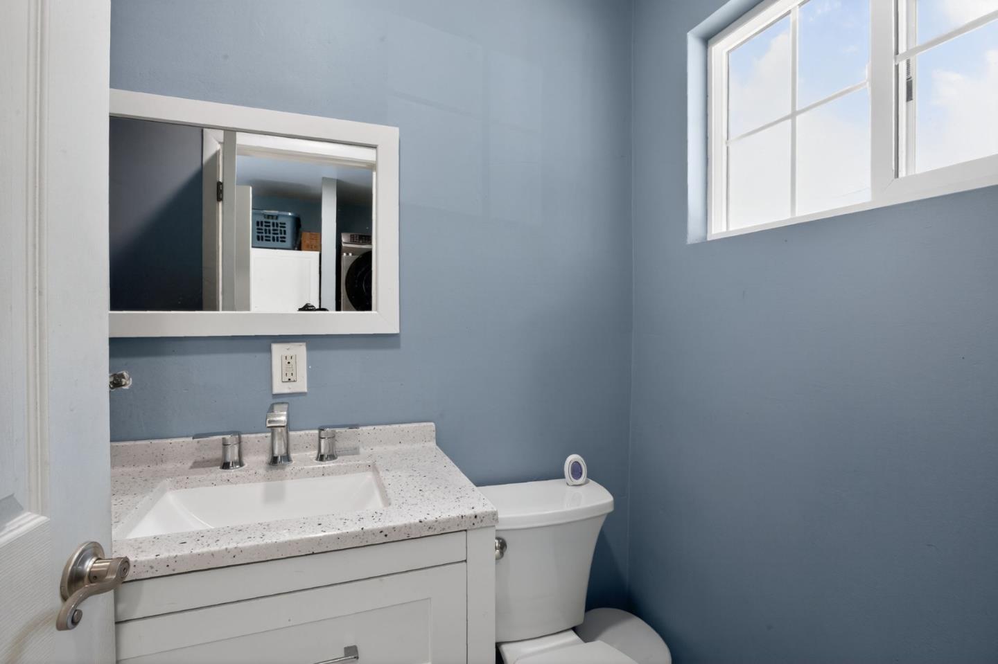 24 Amesti Road Watsonville, CA 95076 - Photo 21 of 27 a bathroom with a toilet sink and mirror