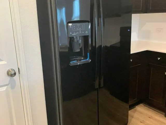 a view of an empty room and closet