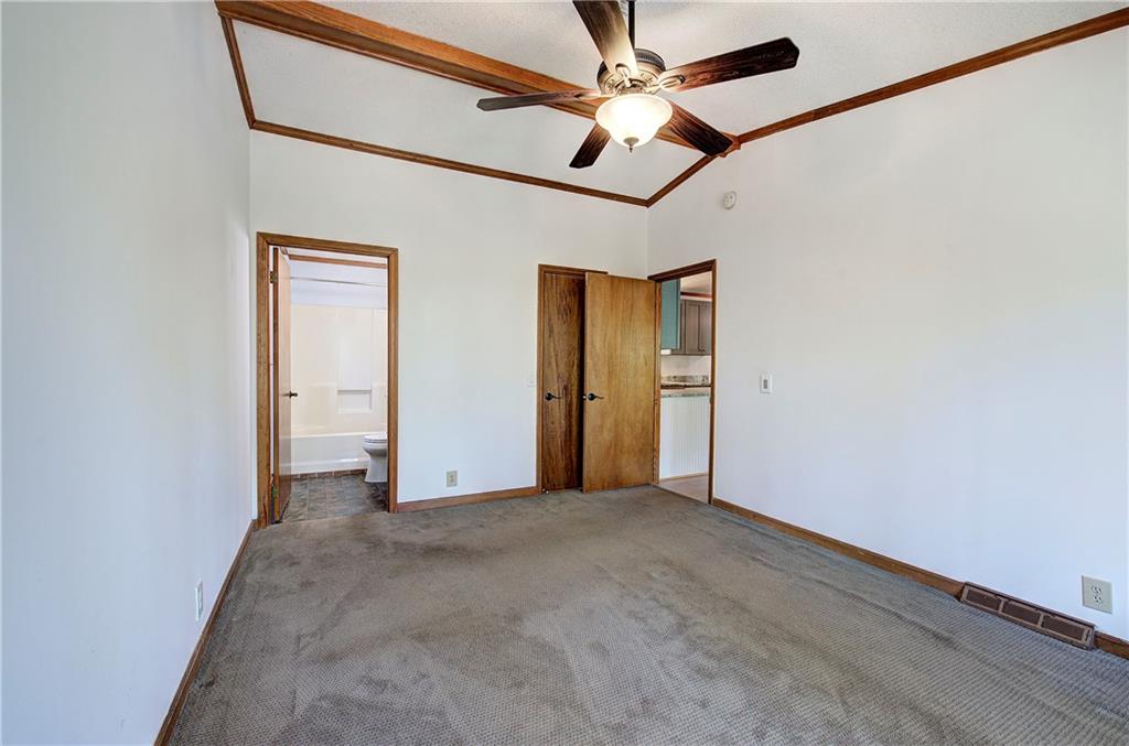 147 Laurel Mill Trail Jasper, GA 30143 - Photo 20 of 64 en empty room with ceiling fan and window