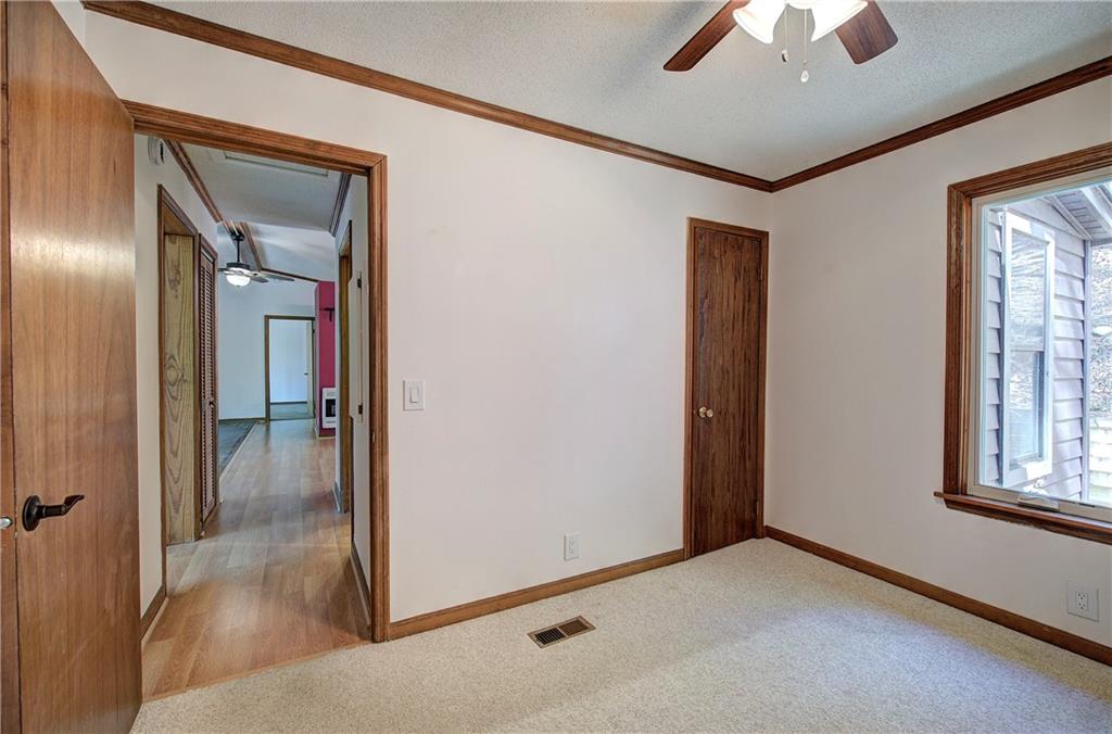 147 Laurel Mill Trail Jasper, GA 30143 - Photo 28 of 64 an empty room that has a window and wooden floor