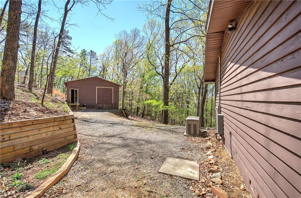 147 Laurel Mill Trail Jasper, GA 30143 - Photo 33 of 64 a view of a house with a yard