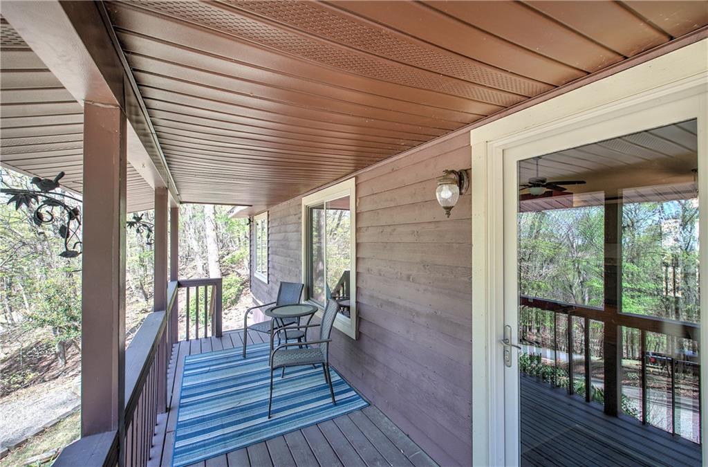 147 Laurel Mill Trail Jasper, GA 30143 - Photo 4 of 64 a porch with wooden floor