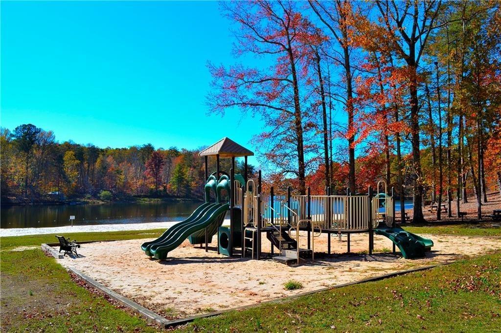 147 Laurel Mill Trail Jasper, GA 30143 - Photo 52 of 64 a view of a park with swings and slides