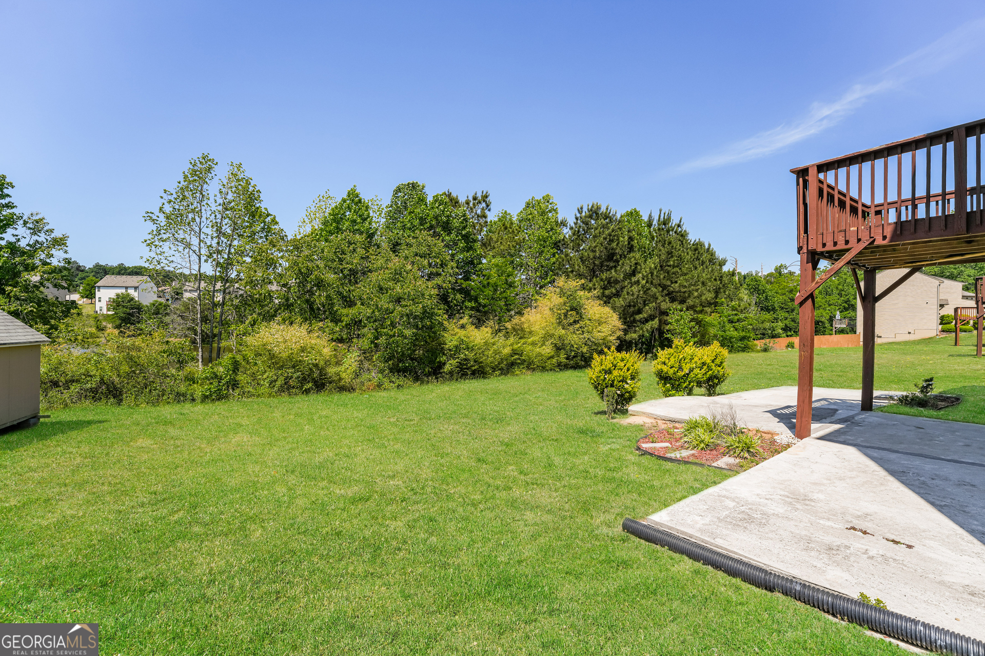 830 Castilla Way Winder, GA 30680 - Photo 19 of 23 a backyard of a house with lots of green space