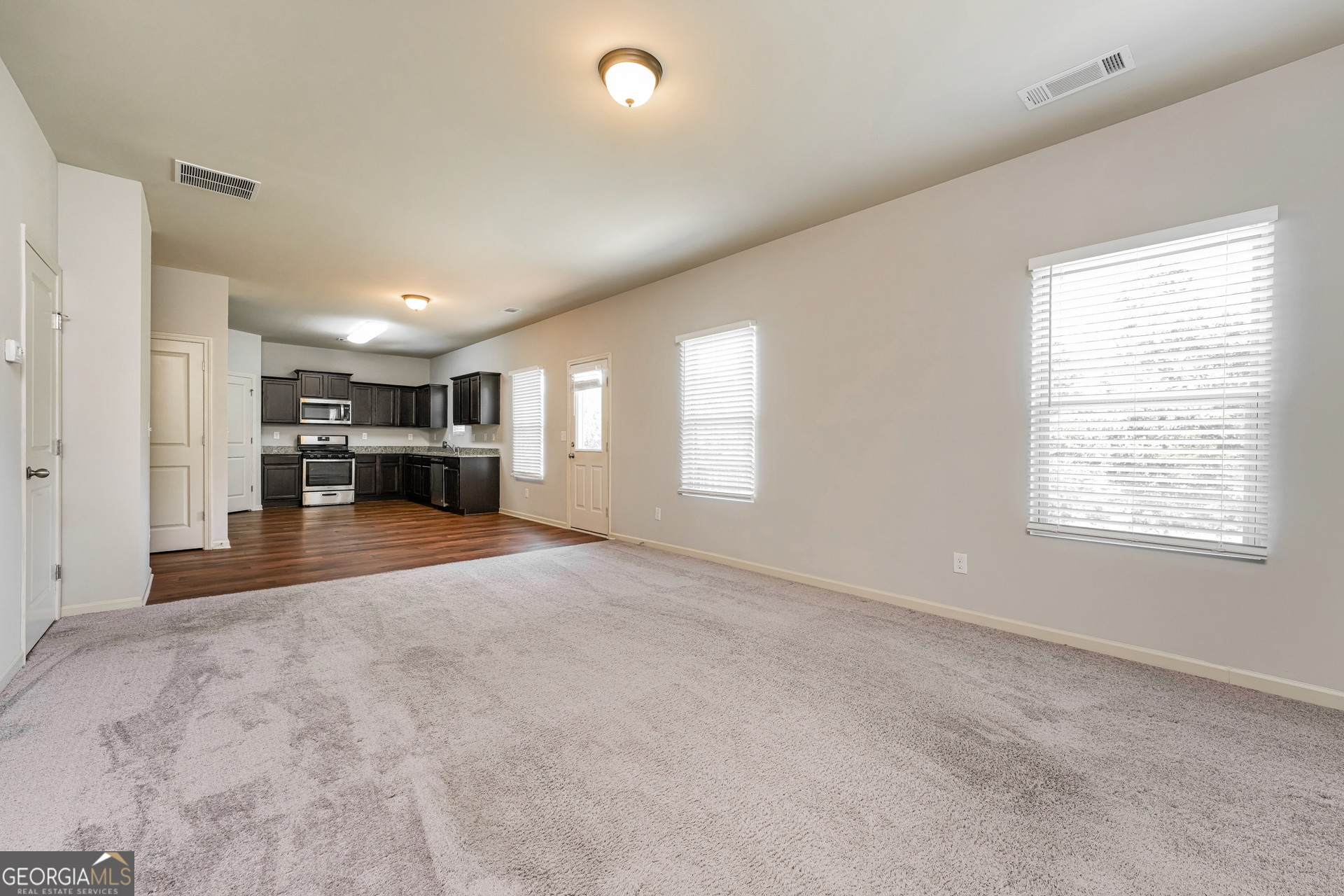 830 Castilla Way Winder, GA 30680 - Photo 3 of 23 a view of living room and a window
