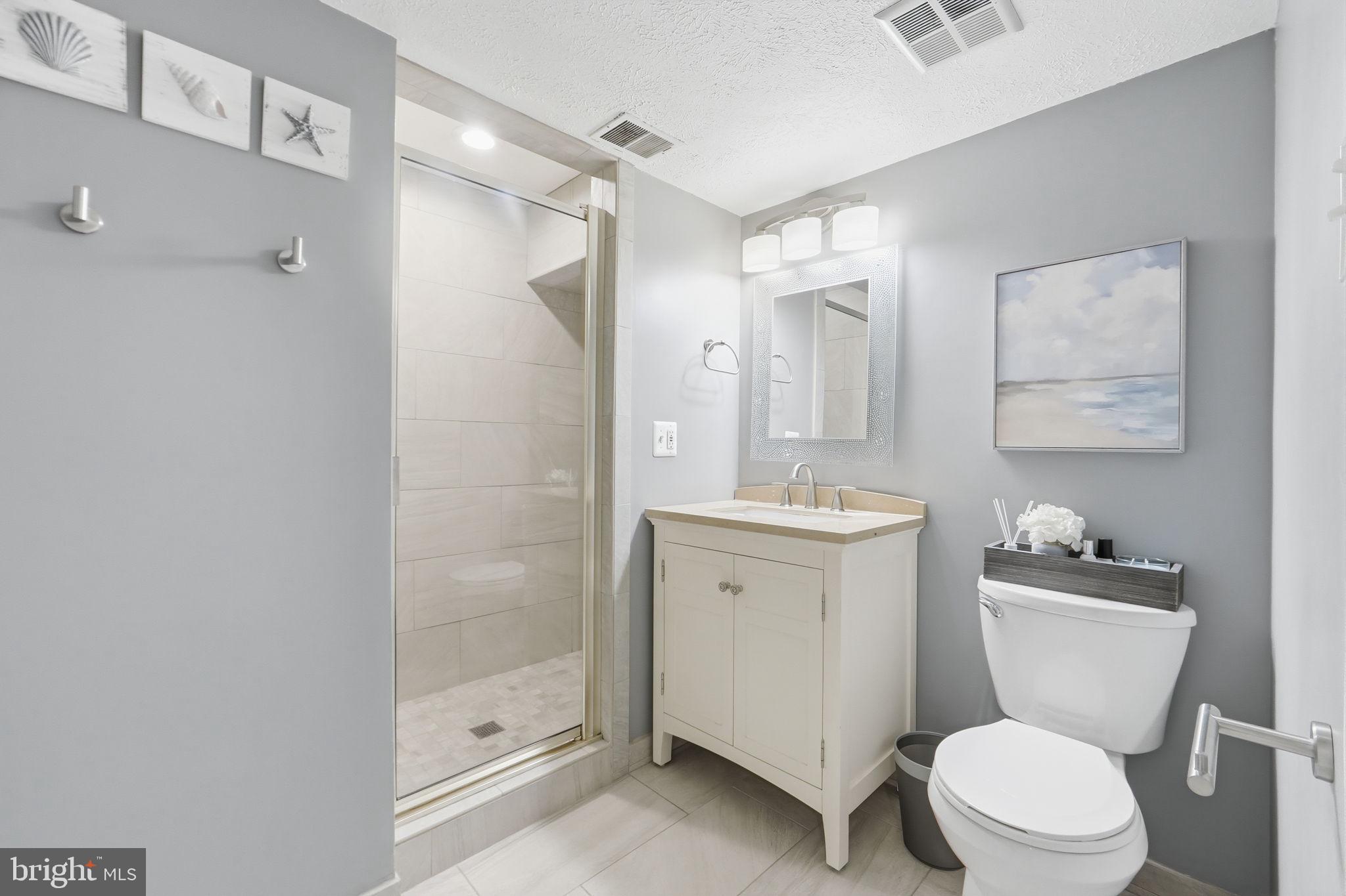7660 Southern Oak Drive Springfield, VA 22153 - Photo 30 of 37 LOWER LEVEL FULL BATH 3 W/WALK IN SHOWER