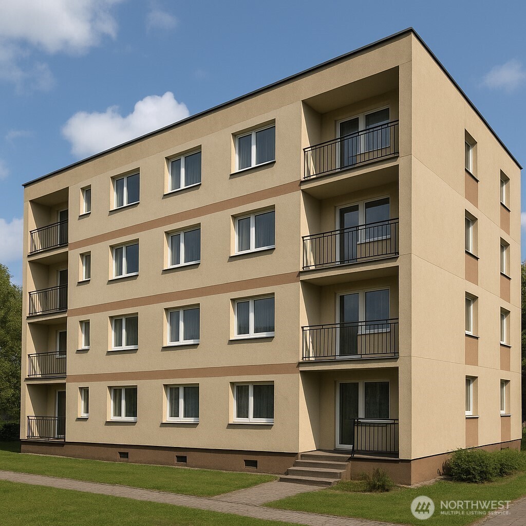 6221 South 129th Street Seattle, WA 98178 - Photo 19 of 20 a front view of a building