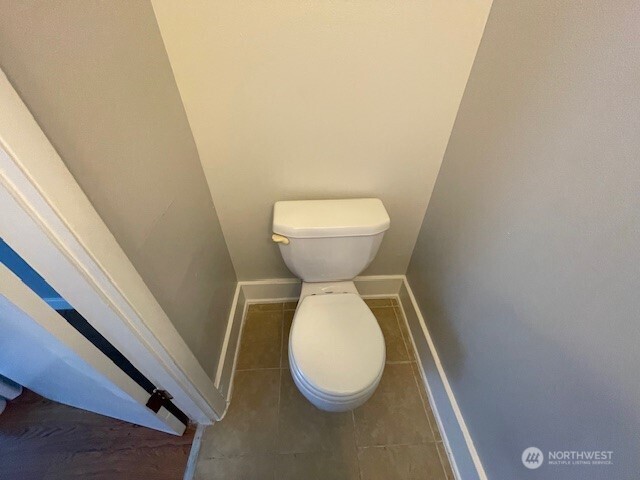 6221 South 129th Street Seattle, WA 98178 - Photo 9 of 20 a bathroom with a toilet and a sink